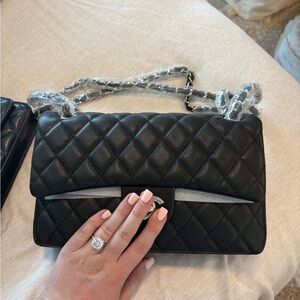 NEW. CC Black Quilted Satchel
